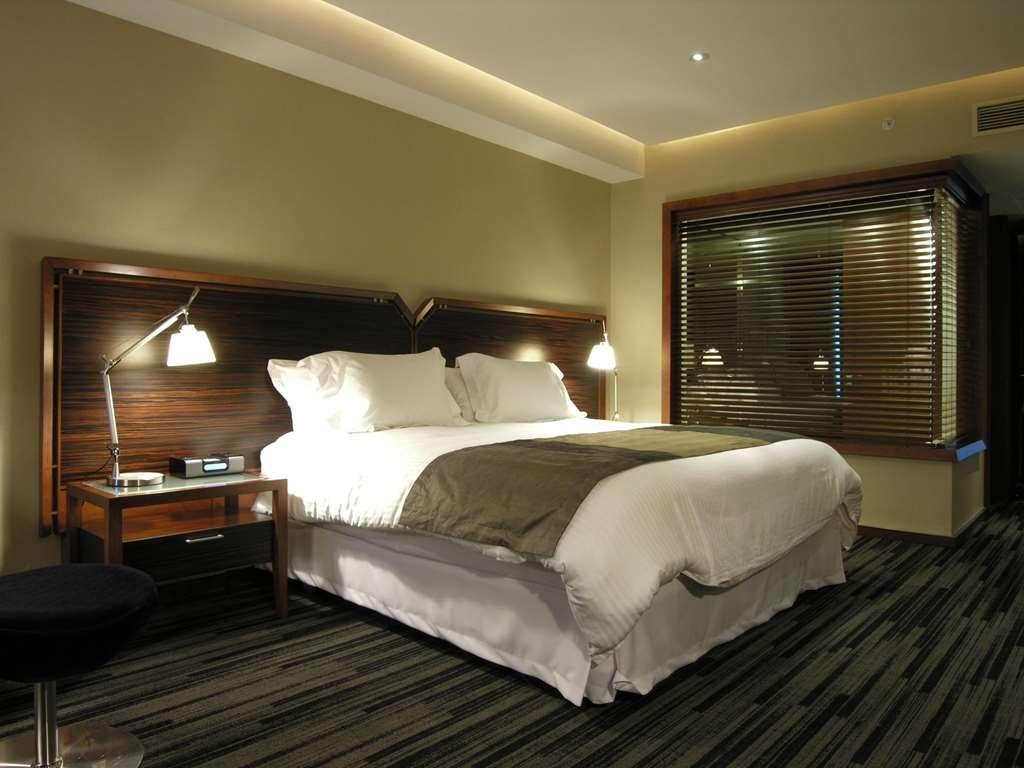 Hotel Dreams Valdivia Oda fotoğraf A bedroom