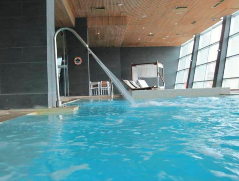 Hotel Dreams Valdivia Dış mekan fotoğraf The swimming pool at the hotel
